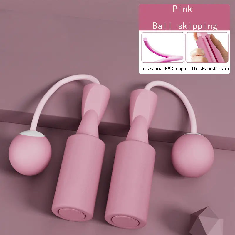 Pink VersaRope dual-mode cordless jump rope set with thickened foam handles and weighted PVC balls.