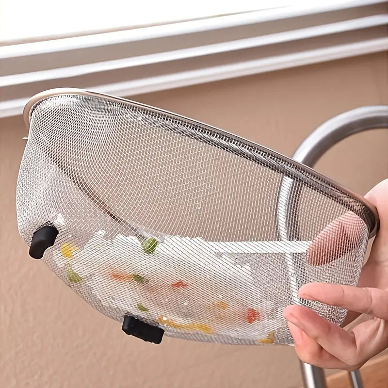Triangle stainless steel mesh strainer with black feet, holding a mix of rice and colorful vegetables.