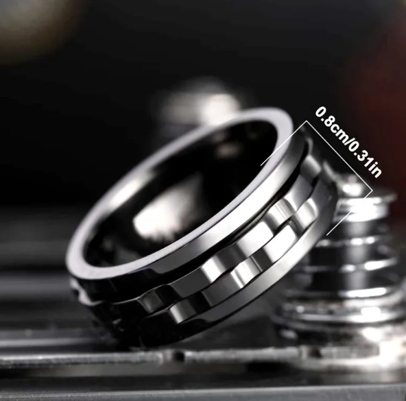 Matte black titanium steel gear fidget ring with a 0.8cm width band, featuring a mechanical, industrial design.