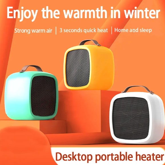 Three compact, colorful portable desk heaters in mint, yellow, and white, each with a top carrying handle and mesh grill.
