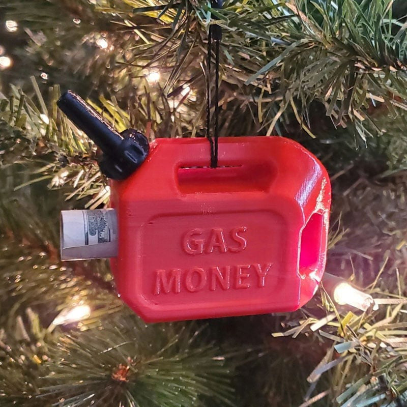 Red plastic gas can Christmas ornament labeled "GAS MONEY" with a rolled-up bill tucked into the side.