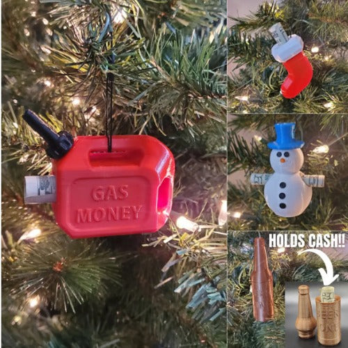 Red gas can Christmas ornament labeled "GAS MONEY" hanging on a tree, plus a stocking, snowman, and bottle ornament.