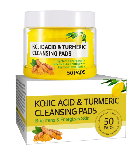Kojic Acid & Turmeric Cleansing Pads in a yellow jar atop a matching product box featuring lemon and turmeric imagery.