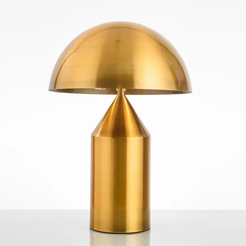 Modern copper-toned mushroom desk lamp featuring a rounded dome shade and a smooth, cylindrical base.