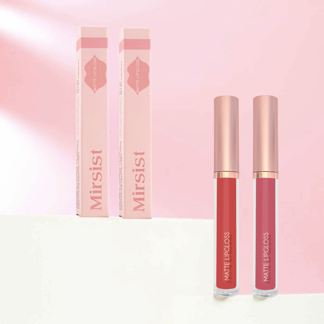 Two Mirsist matte lip glosses in red and rose shades with matching slim pink cardboard packaging.