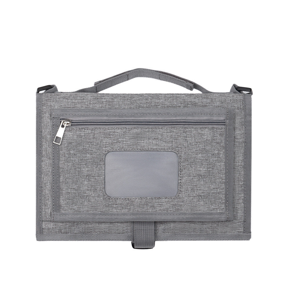 Foldable grey fabric baby changing mat with a top handle, zippered pocket, and clear identification window.