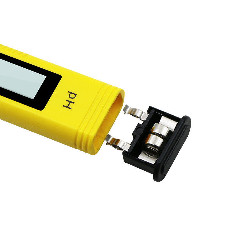 Yellow compact pH meter with a detached black battery compartment showing two silver button cell batteries.