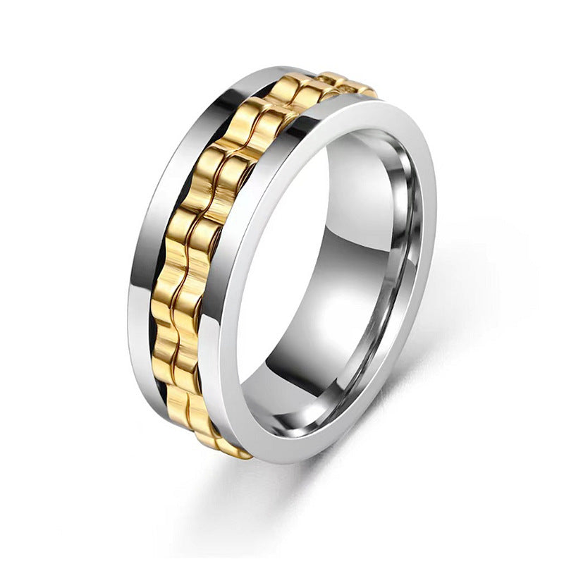 Titanium steel fidget ring with a silver outer band and a spinning gold-toned gear-link center.