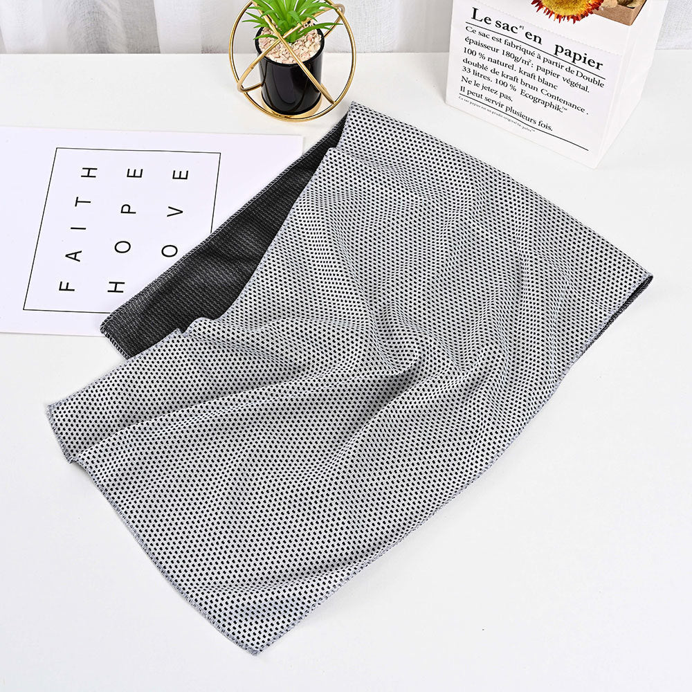 SwiftCool outdoor activity towel in gray and black with a textured, perforated cooling fabric design.