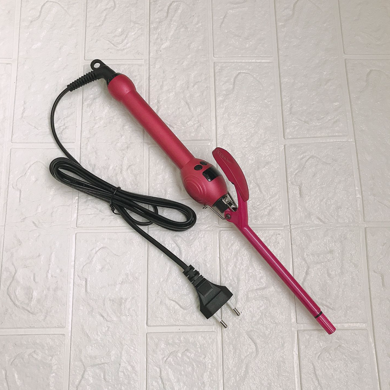 Hot pink 9mm curling iron with an LCD temperature display, ergonomic handle, and black power cord on a white background.