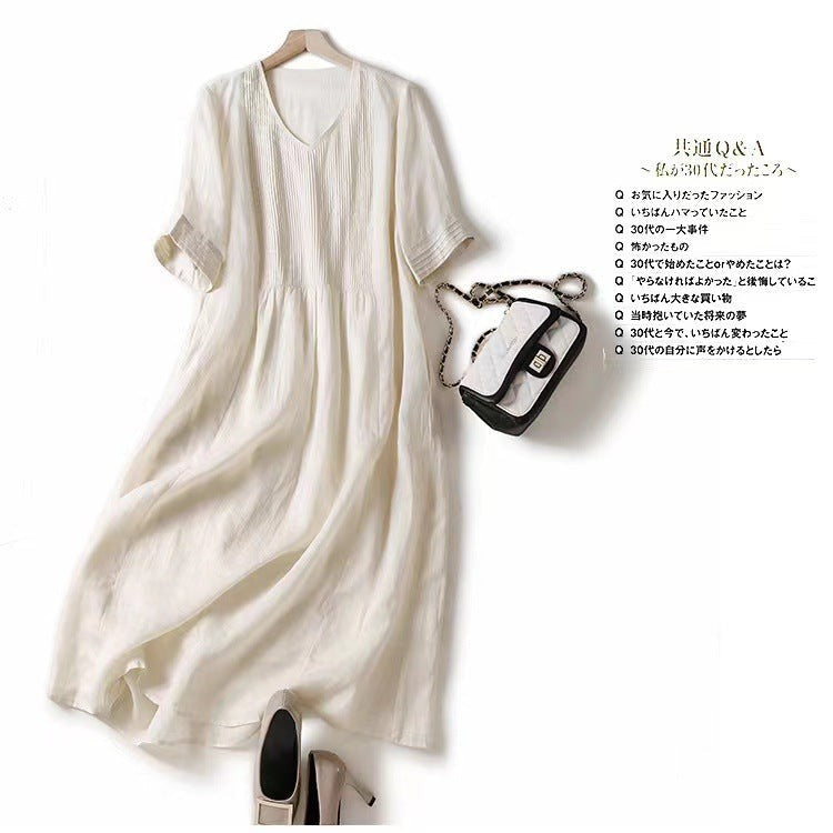 Creative Vault Marketplace apricot cotton linen midi dress with V-neck, half sleeves, and vintage pleated detailing.