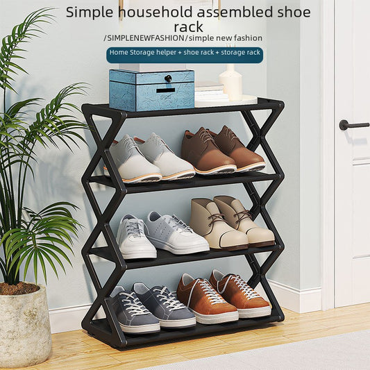 Creative Vault Marketplace black metal X-frame shoe rack with three tiers holding various sneakers and dress shoes