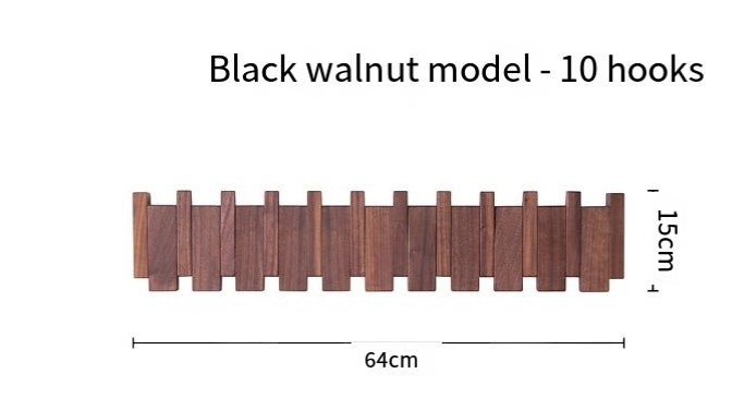 Creative Vault Marketplace black walnut piano key coat rack with 10 hooks for wall-mounted storage.