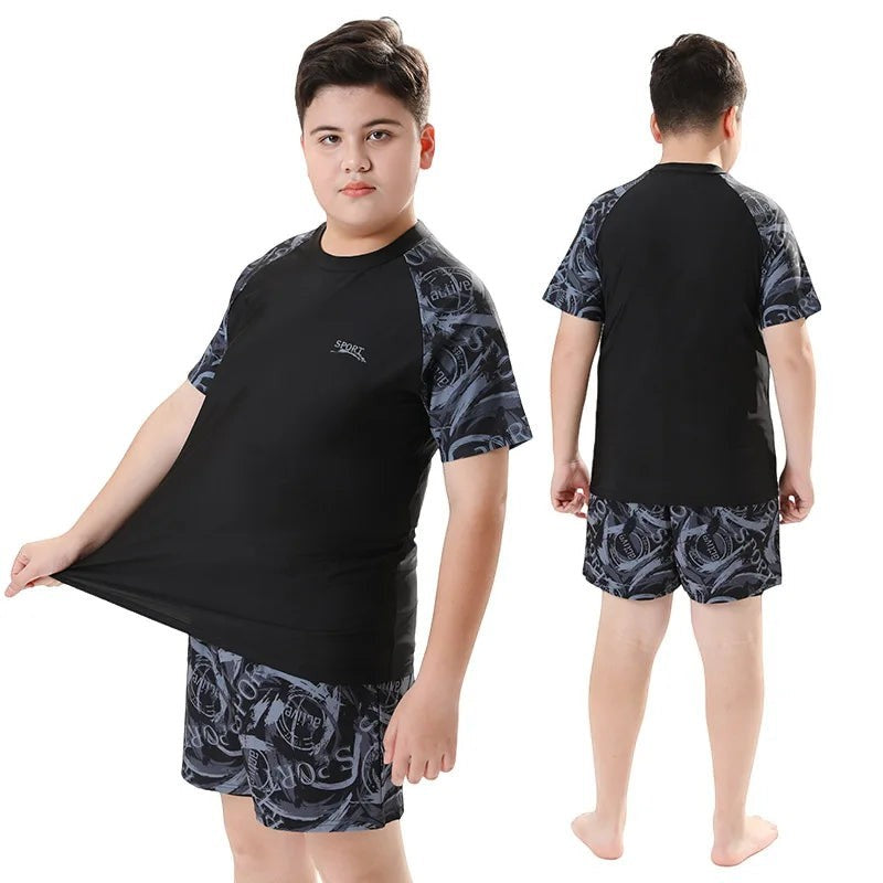 Creative Vault Marketplace boys' two-piece black and grey patterned short-sleeve swim set with matching cap
