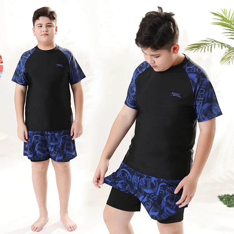 Creative Vault Marketplace boys two-piece black and blue patterned short sleeve swimwear set with matching swim cap
