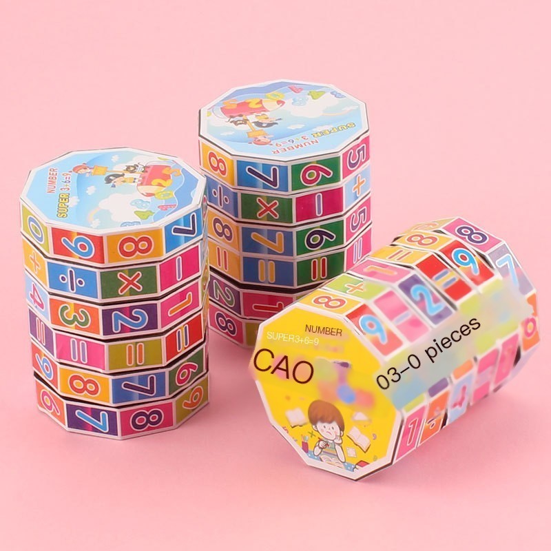 Creative Vault Marketplace kids' math cylinder puzzle toys with colorful numbers and arithmetic symbols on a pink background