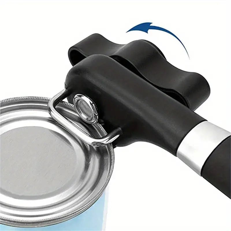 Creative Vault Marketplace stainless steel can opener with black ABS head and handle cutting into a metal can