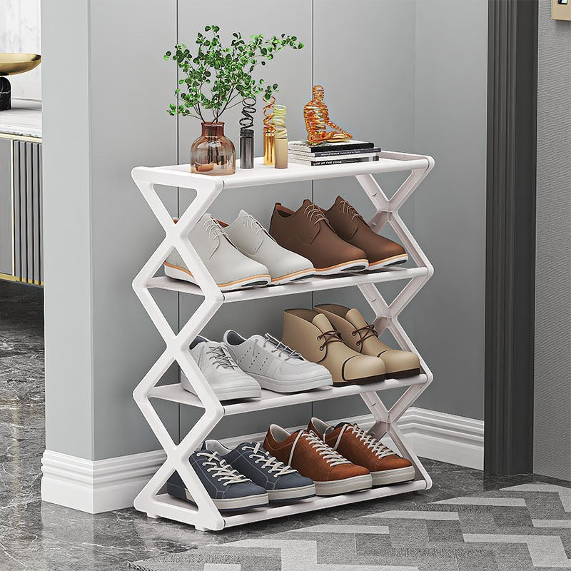 Creative Vault Marketplace white metal X-frame shoe rack with three tiers holding various sneakers and dress shoes