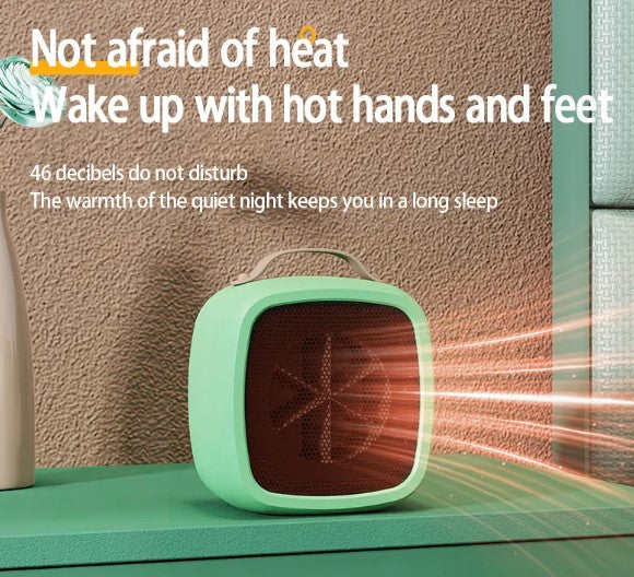Compact, mint-green portable space heater with a top handle, mesh front, and glowing orange heat effect.