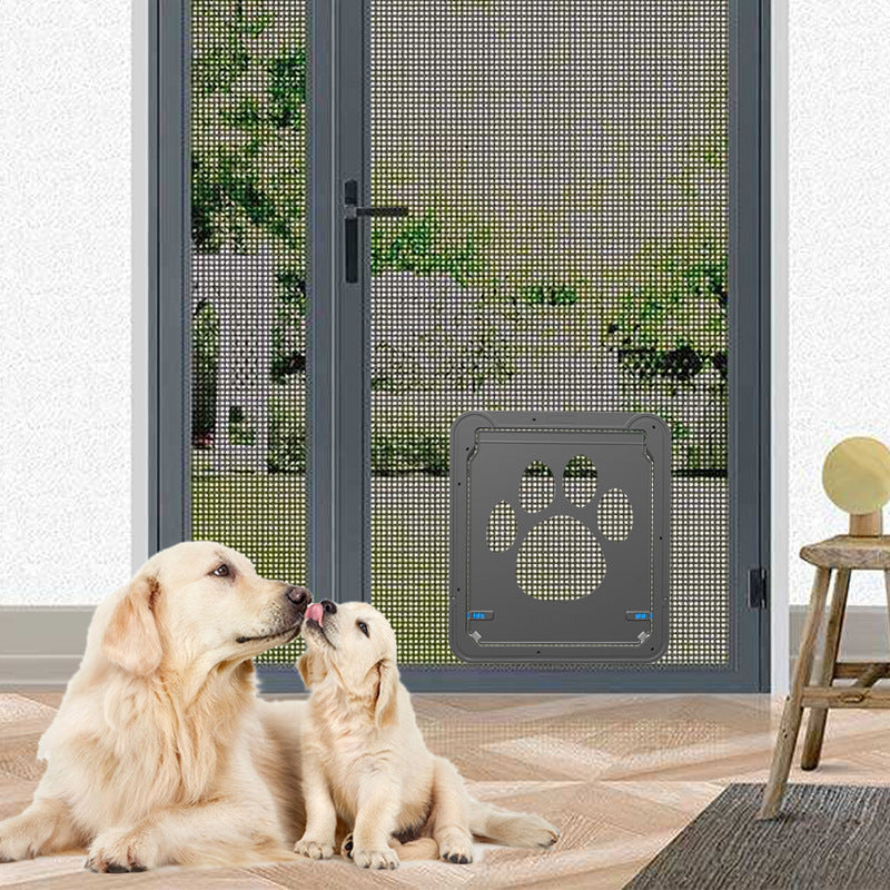 Dark gray scratchproof pet door with paw-print design installed on a screened door next to two golden retrievers.