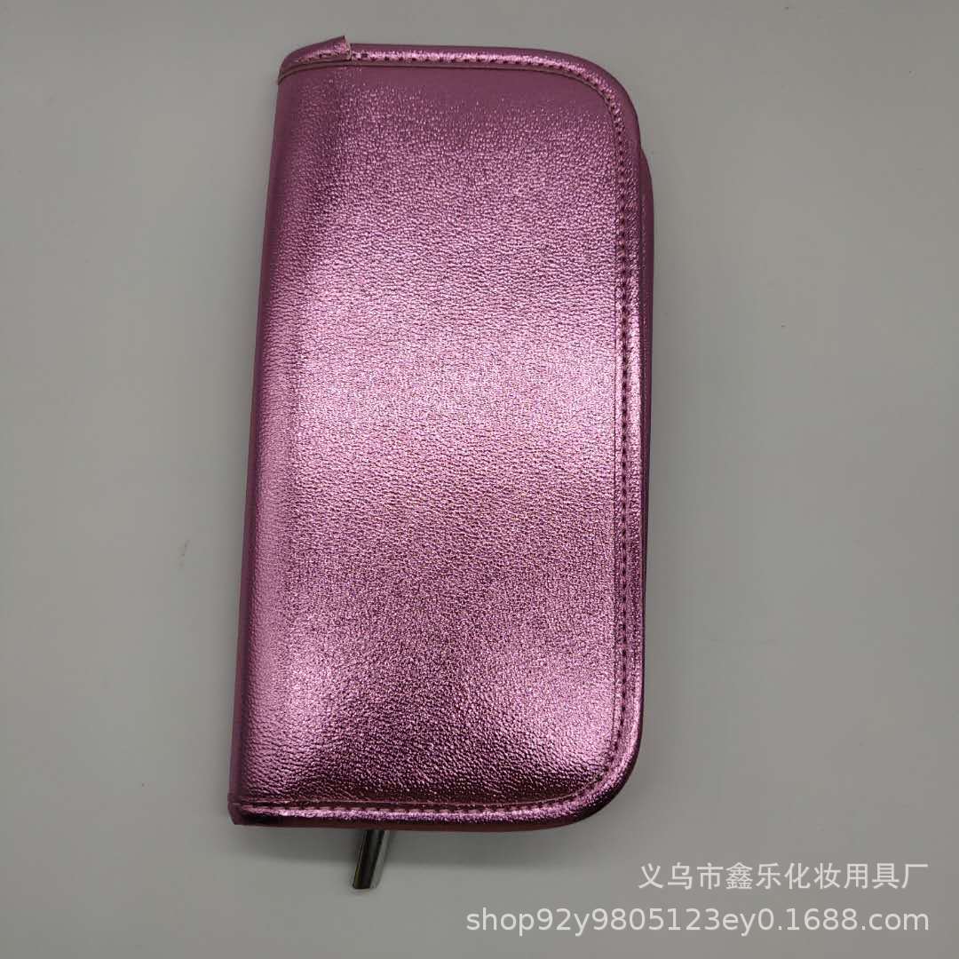 Metallic pink zippered brush case for the Beauty Master 10-piece kit, featuring a sleek, textured finish.