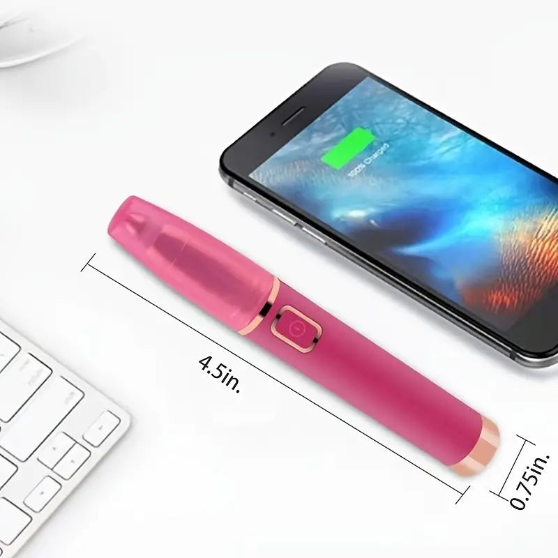 Pink, rechargeable hair remover with rose gold accents, measured at 4.5 inches long, resting near a smartphone.