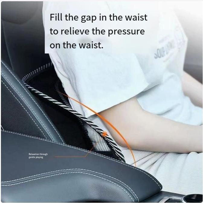 Black ergonomic car lumbar support cushion with mesh detailing, positioned on a car seat behind a person’s back.