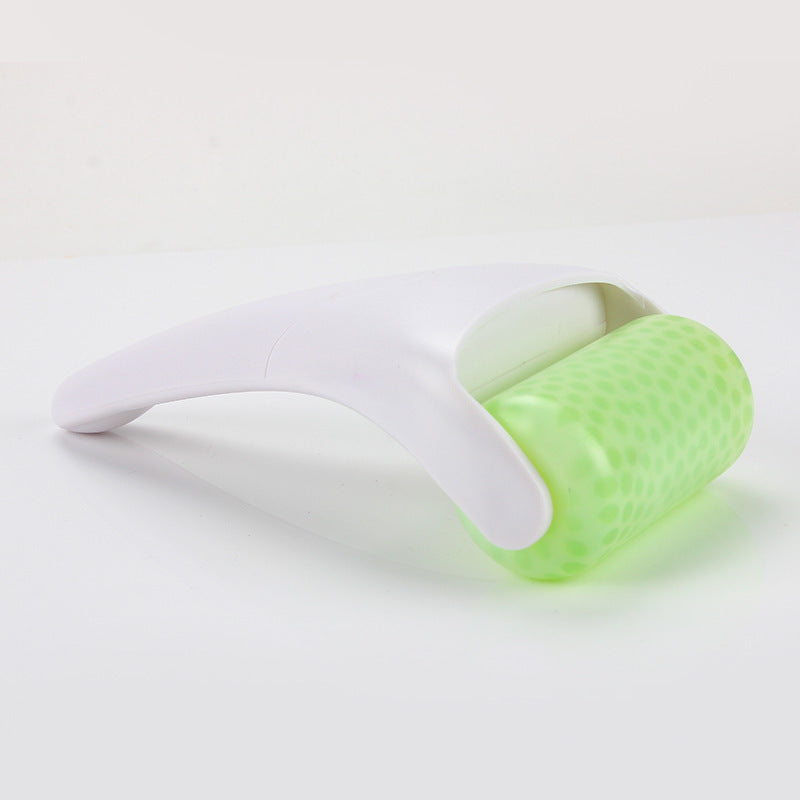 Chill Glide facial ice roller with a white ergonomic handle and a textured, translucent light-green roller drum.